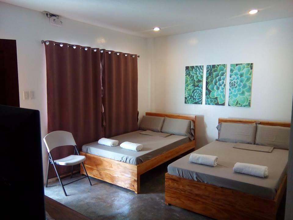 Mother Teresa Rooms And Restaurant Oslob Bagian luar foto
